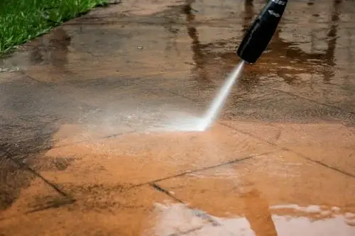 Water draining slowly, a common sign a drain needs professional cleaning